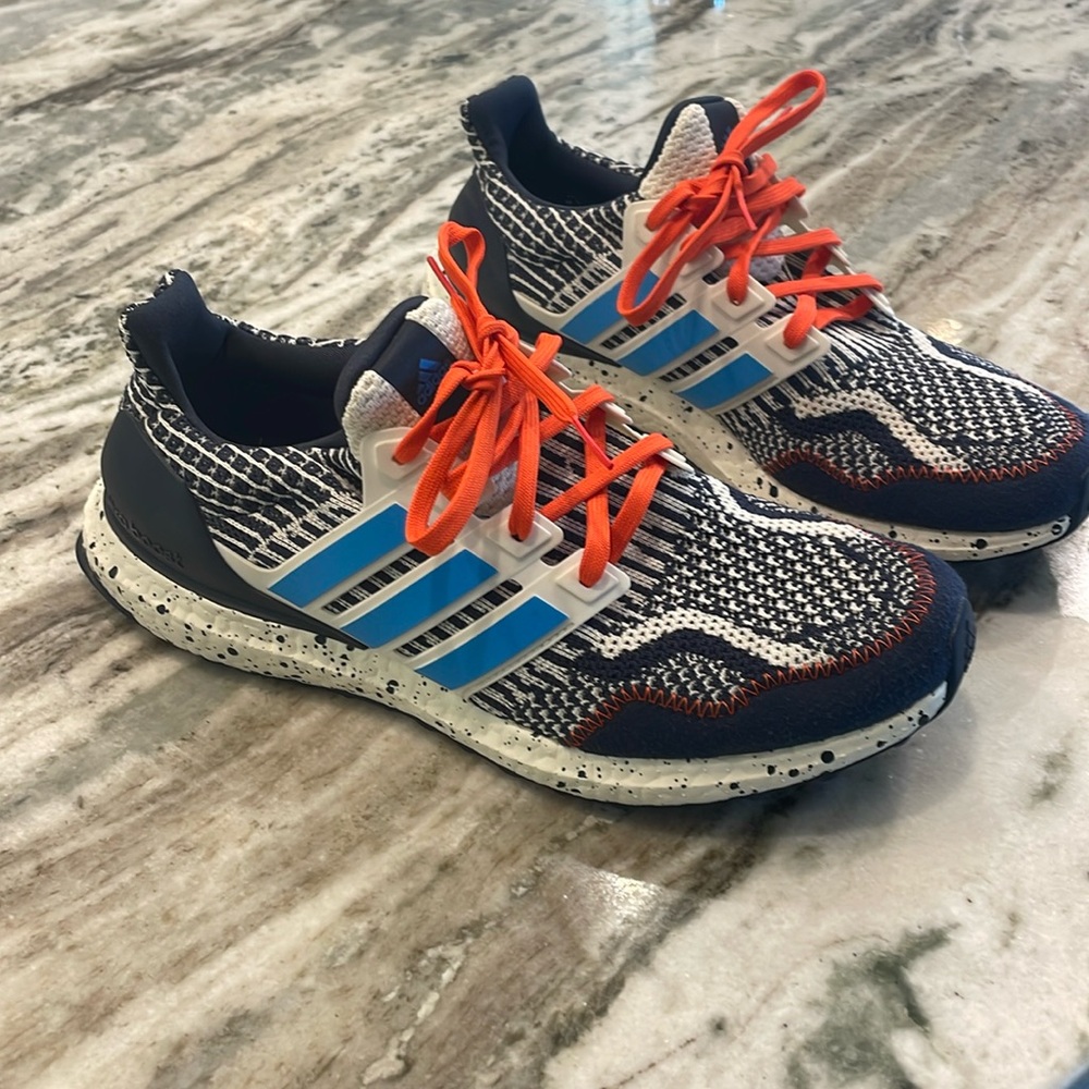 navy, white, and orange ultraboosts